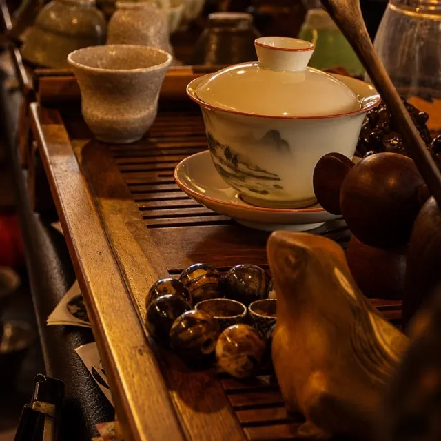 White gaiwan on the tea table